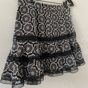 NEVER WORN. Bardot Mini Skirt with Floral Design.